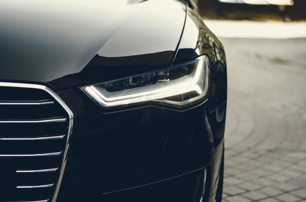 a close up photo of a car's left headlight